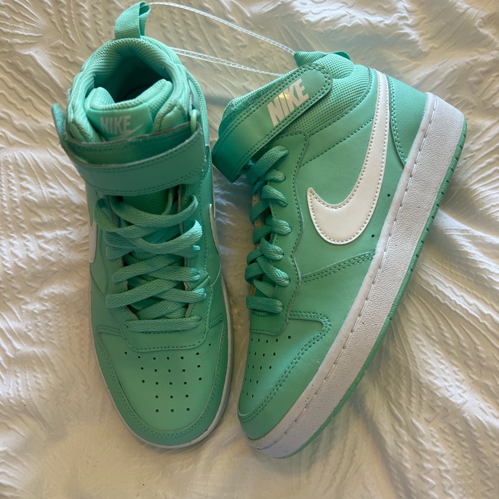 New turquoise Nike High Tops
